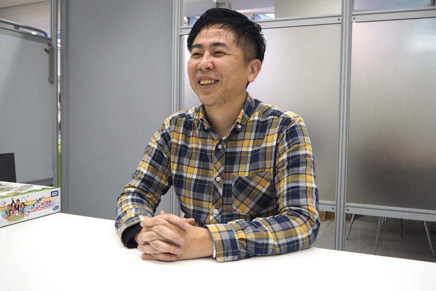人生ゲームの開発とマーケティングを担当する池田さん（2018年12月19日高橋亜矢子撮影）