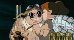 自分に豚になる魔法をかけてしまったポルコ・ロッソと、飛行艇の設計師としてポルコを支えるフィオ　(C)1992 Studio Ghibli・NN