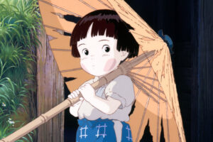 ボロボロの傘をさす節子。画像は『火垂るの墓』静止画より (C)野坂昭如/新潮社, 1988