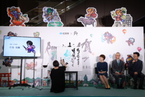 書道パフォーマンス中の書家・江島史織氏　(C)SQUARE ENIX　佐賀県